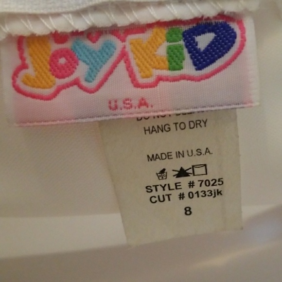 Girls white dress with loose petals in skirt - Picture 4 of 5